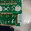 green circuit board with detailed components