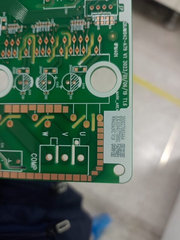 green circuit board with detailed components
