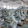 Robotic arms in an automated manufacturing setup-5