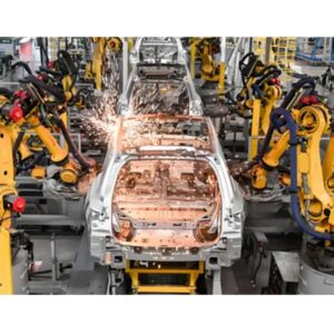 Automated manufacturing line featuring robotic arms performing precision laser welding on a vehicle chassis